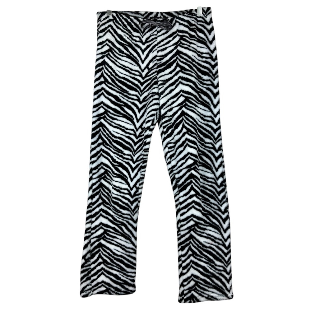 Black and white zebra print fuzzy pj pants with a slight flare.